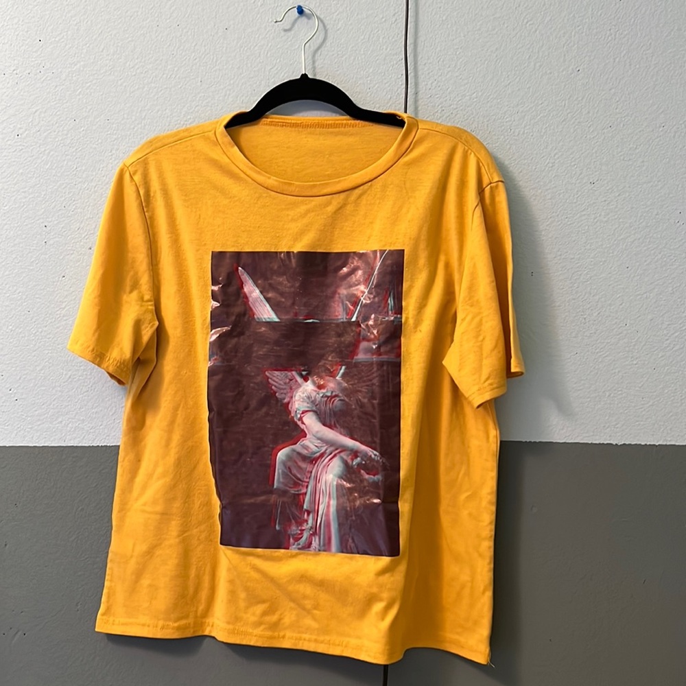 Mustard yellow shirt with an angel design, graphic tee